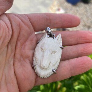 Gypsy Silver hand-carved wolf pendant set in sterling silver